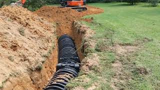 Installing a septic system chamber system Infiltrator drain field [upl. by Chadbourne]